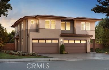 a front view of a house with garage