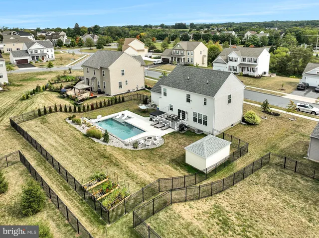 a view of a swimming pool with a lake view
