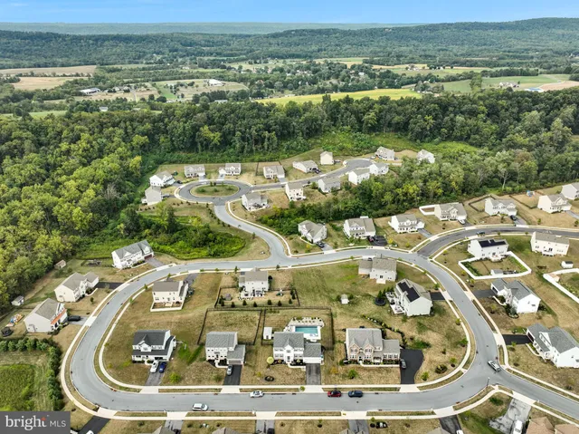 a view of a lake with a house