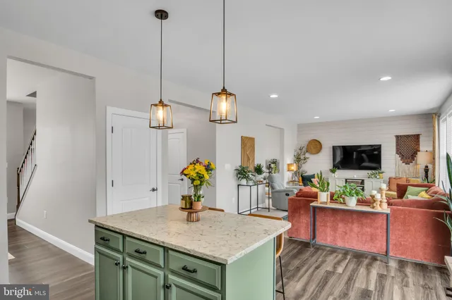 a kitchen with sink and cabinets