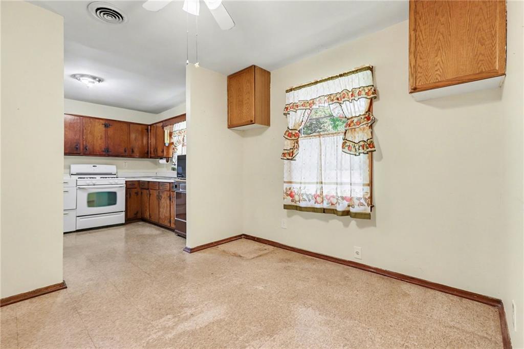 7019 Lake View Lane Doraville, GA 30360 - Photo 10 of 32 a view of a kitchen with furniture and a window
