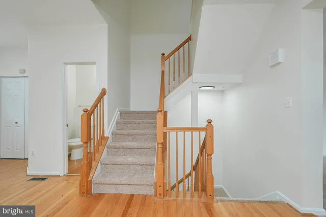 a view of entryway with wooden floor