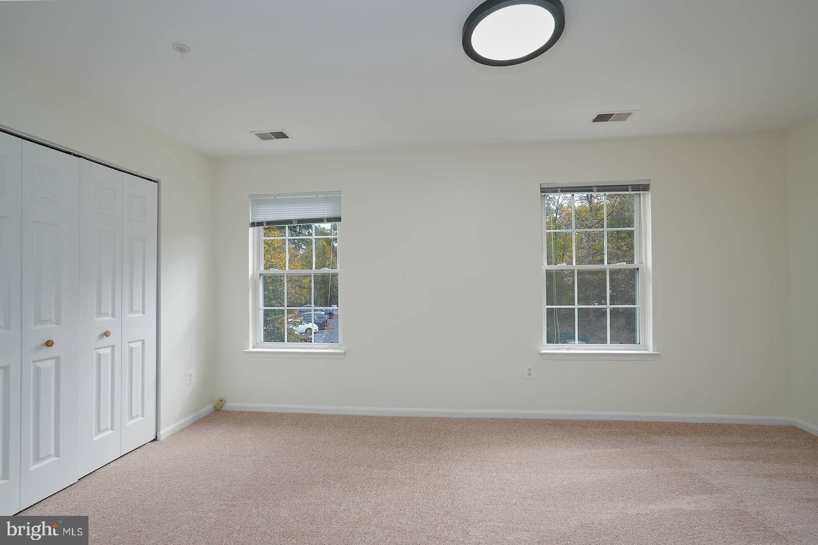 7802 Canter Court Severn, MD 21144 - Photo 26 of 41 an empty room with windows