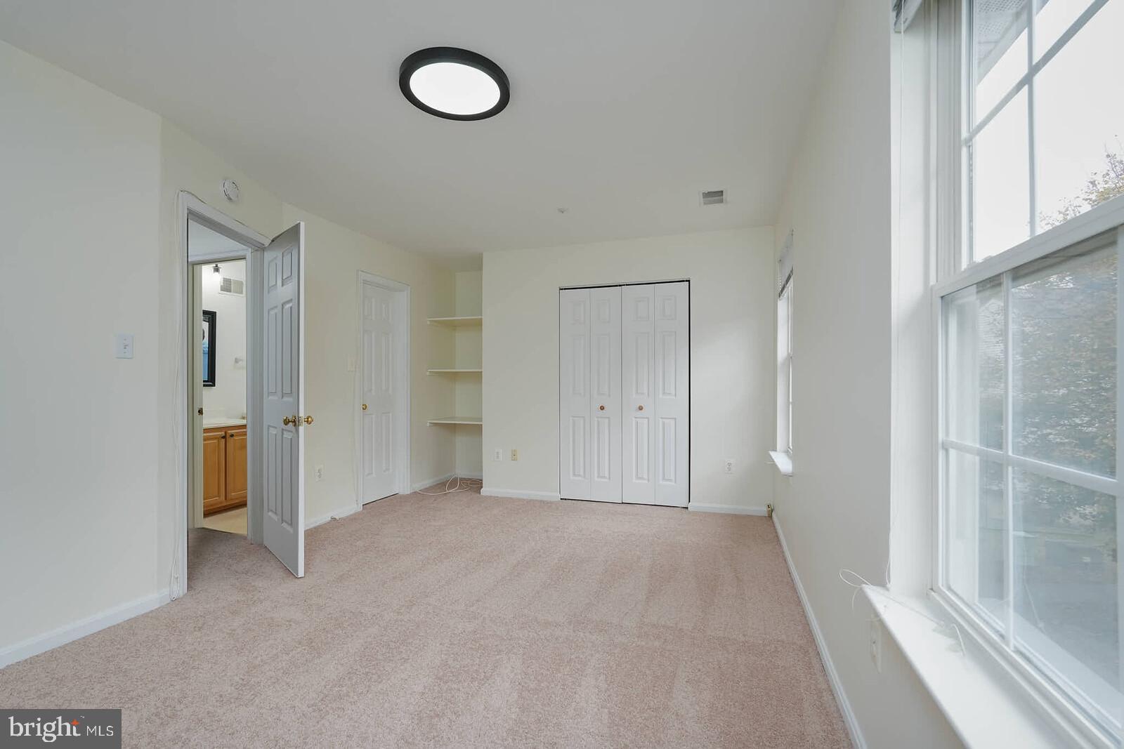 7802 Canter Court Severn, MD 21144 - Photo 28 of 41 a view of an empty room with a window