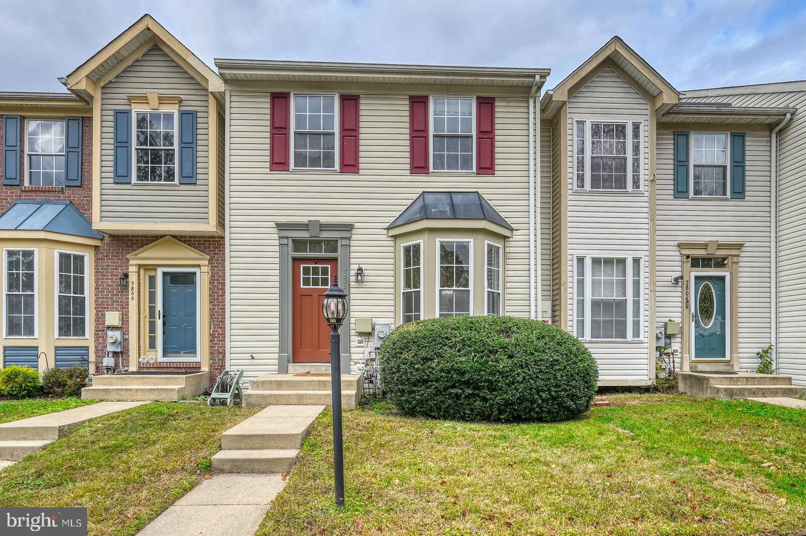 7802 Canter Court Severn, MD 21144 - Photo 3 of 41 a front view of a house with a garden
