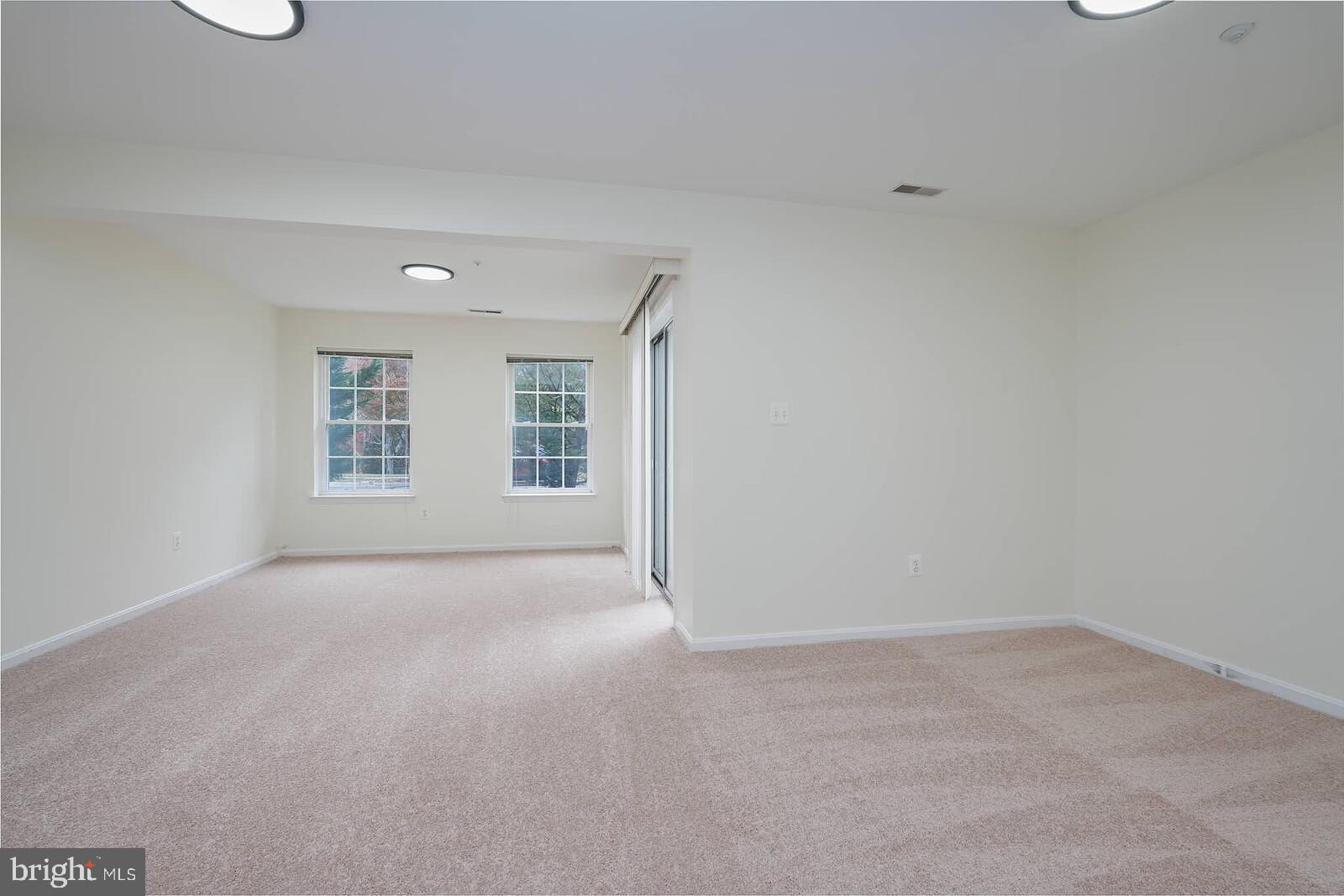 7802 Canter Court Severn, MD 21144 - Photo 33 of 41 an empty room with windows