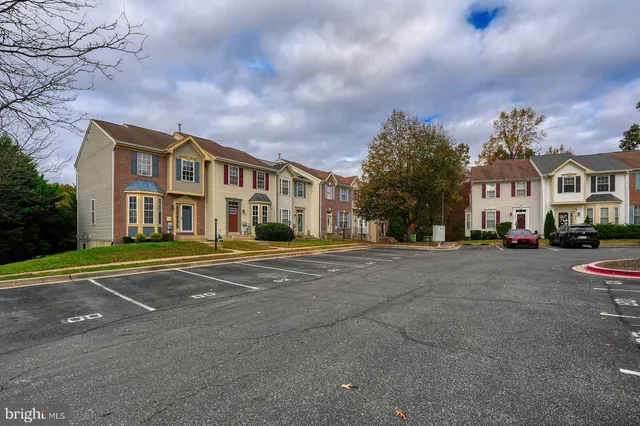 a front view of a building with a street