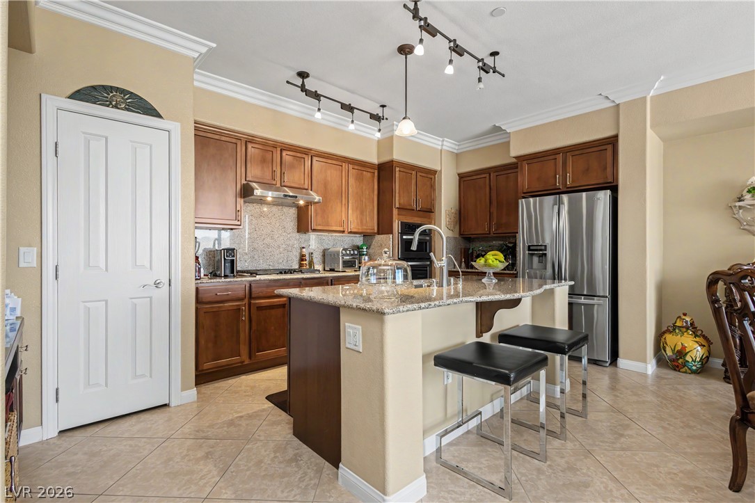 2555 Hampton Road, Unit 3308 Henderson, NV 89052 - Photo 20 of 65 Granite counters and stainless steel appliances complete this well-appointed kitchen.