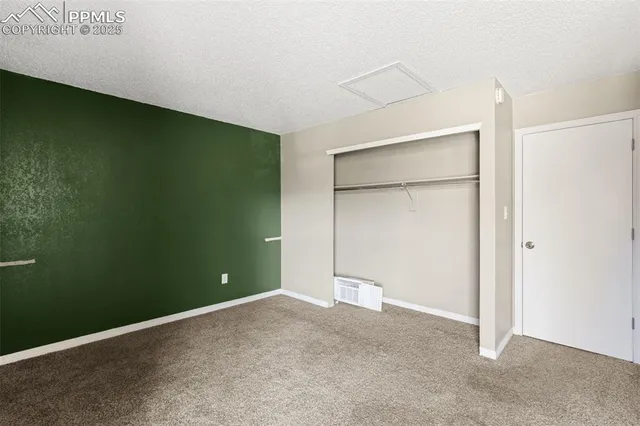 an empty room with closet