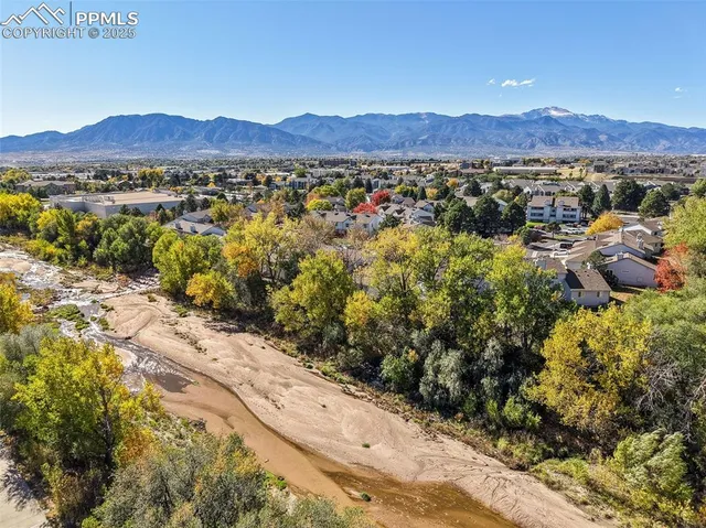 a view of a city and mountains