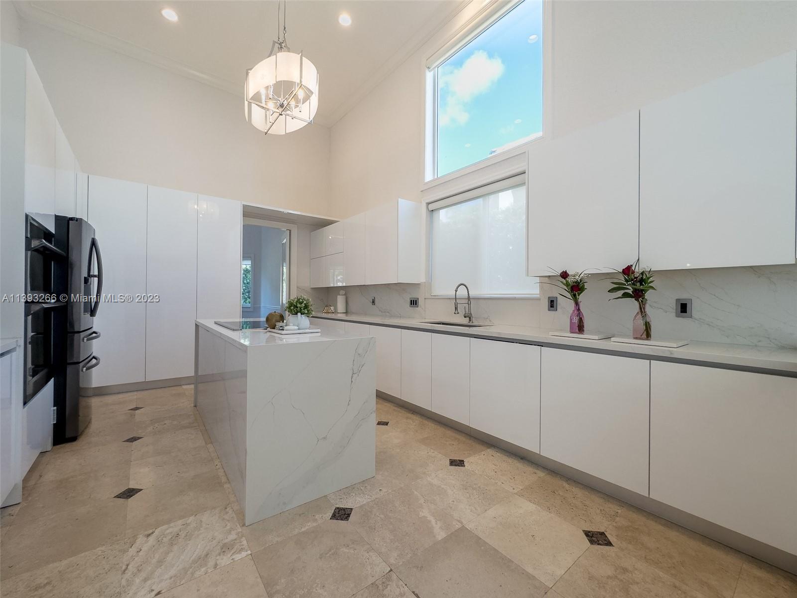 2707 Pinehurst Drive Weston, FL 33332 - Photo 18 of 59 a room with a sink and a mirror