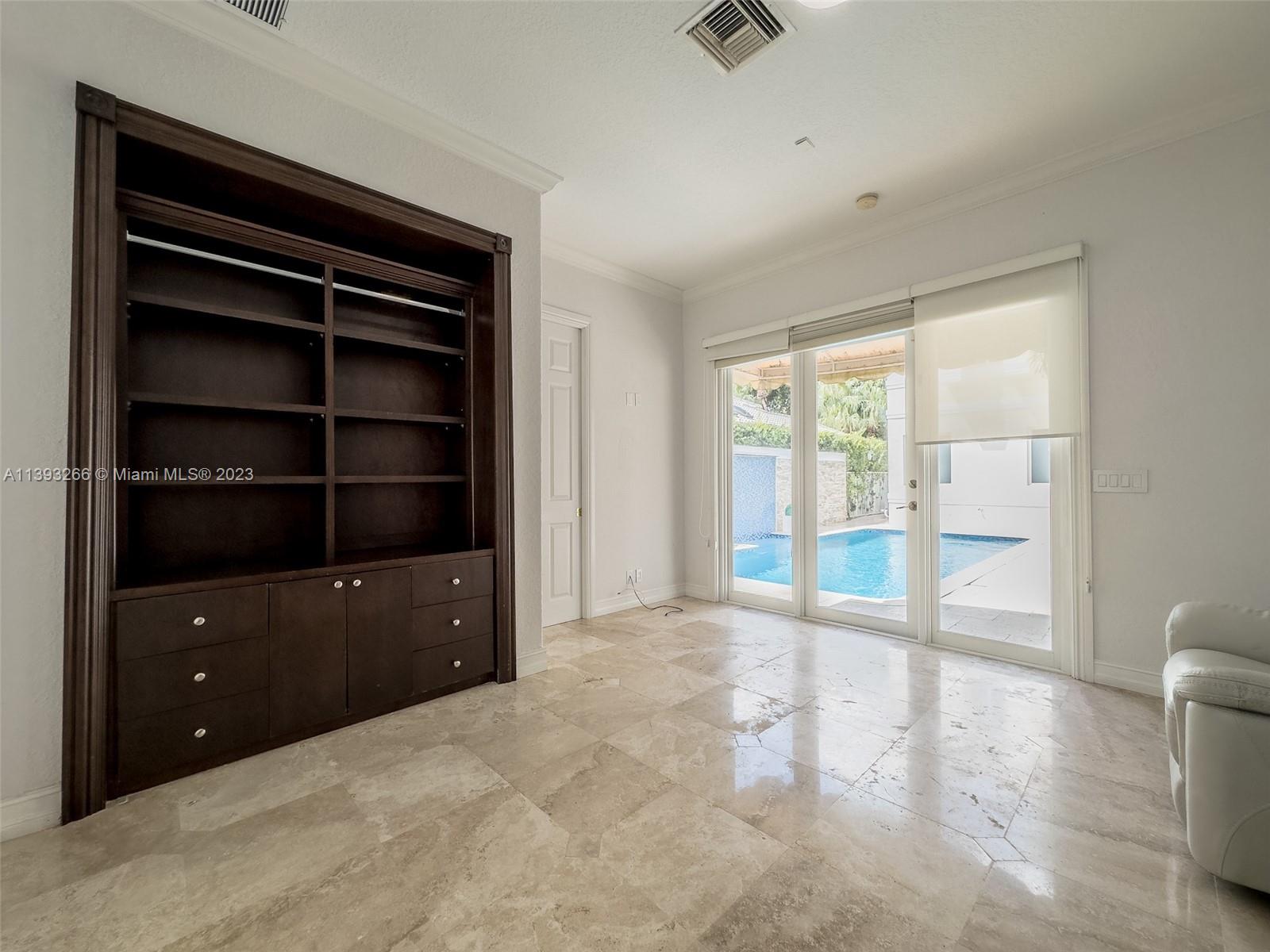 2707 Pinehurst Drive Weston, FL 33332 - Photo 40 of 59 a view of an empty room with a window
