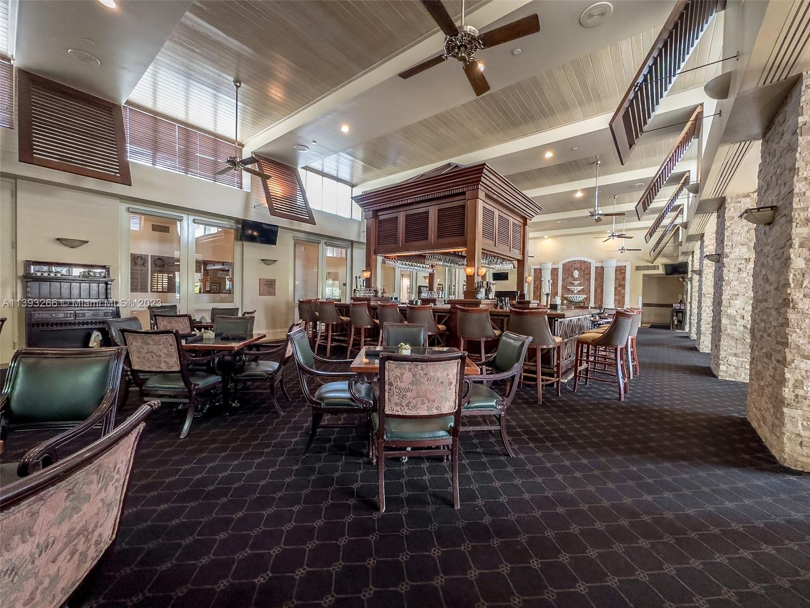 2707 Pinehurst Drive Weston, FL 33332 - Photo 56 of 59 a view of a dining room with furniture