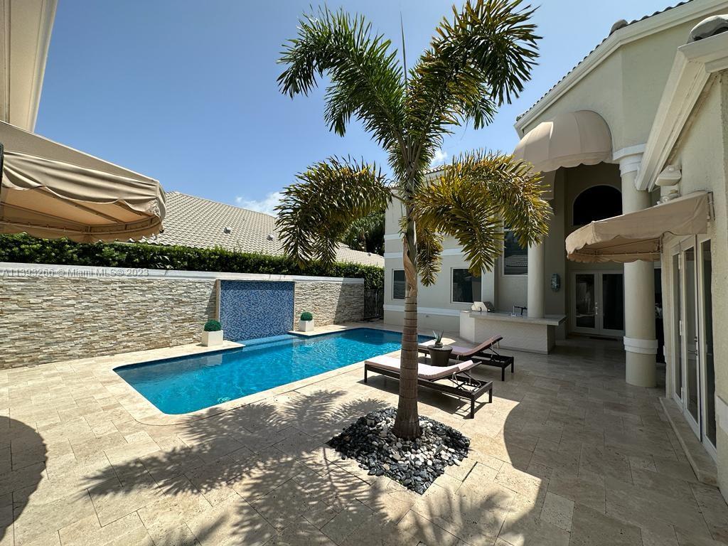 2707 Pinehurst Drive Weston, FL 33332 - Photo 7 of 59 a house view with a sitting space