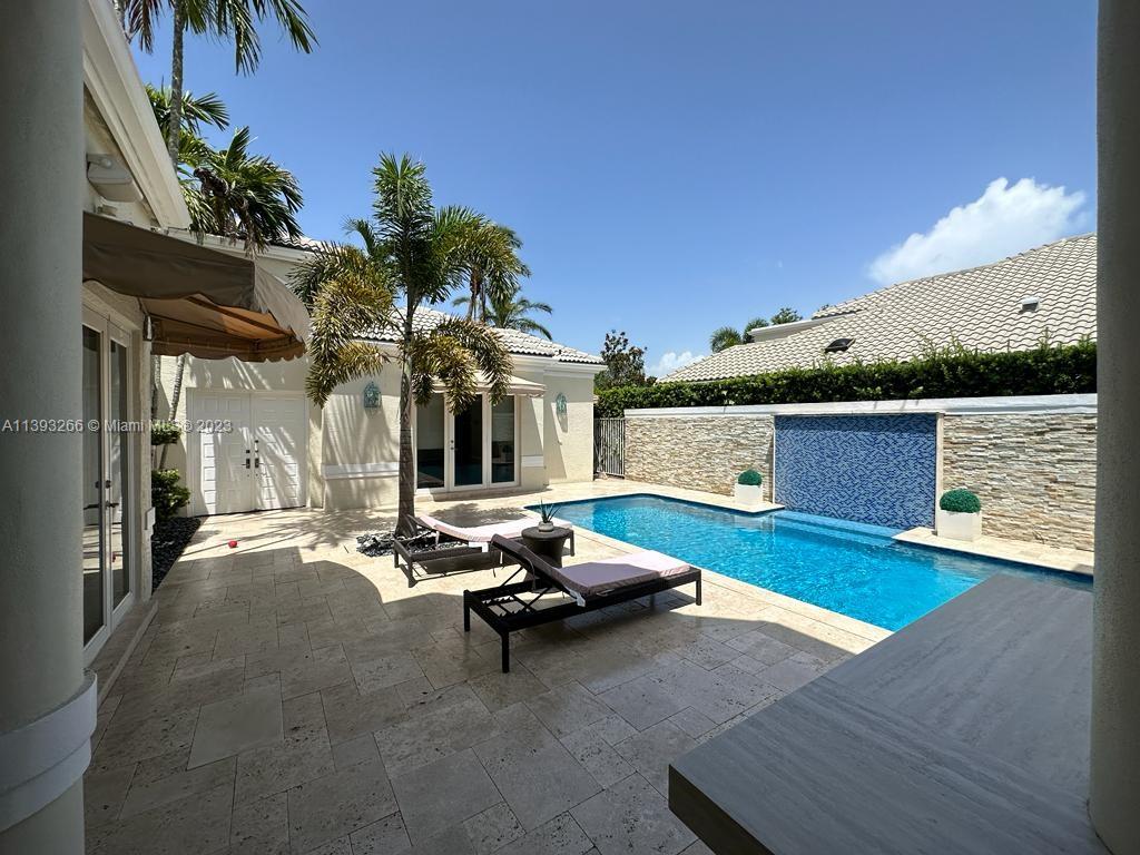 2707 Pinehurst Drive Weston, FL 33332 - Photo 8 of 59 a living room with furniture and a fireplace