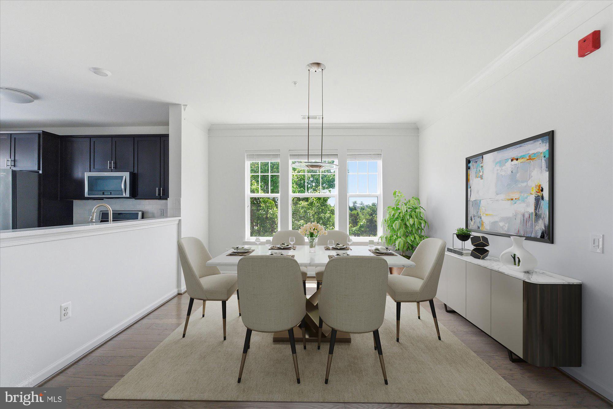 20650 Hope Spring Terrace, Unit 301 Ashburn, VA 20147 - Photo 3 of 35 Virtually staged dining room
