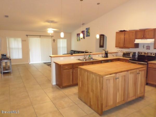 455 Scanlon Road Palm Bay, FL 32908 - Photo 5 of 21 Kitchen & Family Room