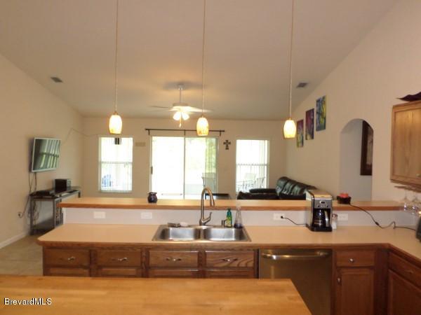 455 Scanlon Road Palm Bay, FL 32908 - Photo 8 of 21 Kitchen to Family Room