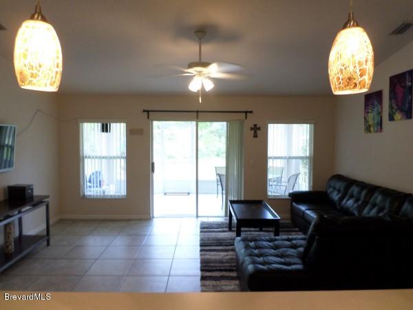 455 Scanlon Road Palm Bay, FL 32908 - Photo 9 of 21 Kitchen to Family Room