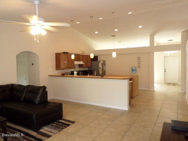 455 Scanlon Road Palm Bay, FL 32908 - Photo 10 of 21 Family Room to Kitchen