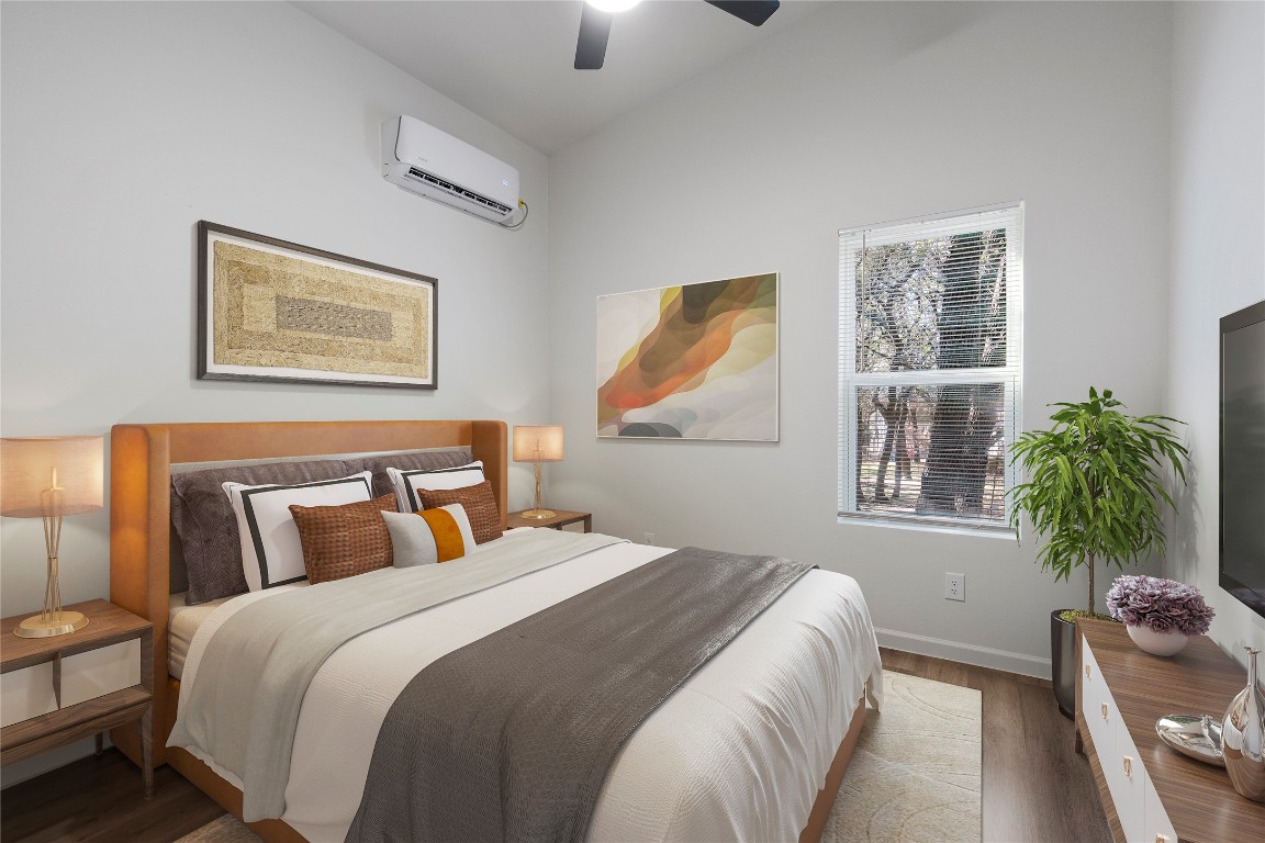 23081 Nameless Road, Unit D Leander, TX 78641 - Photo 13 of 16 a bedroom with bed and a window