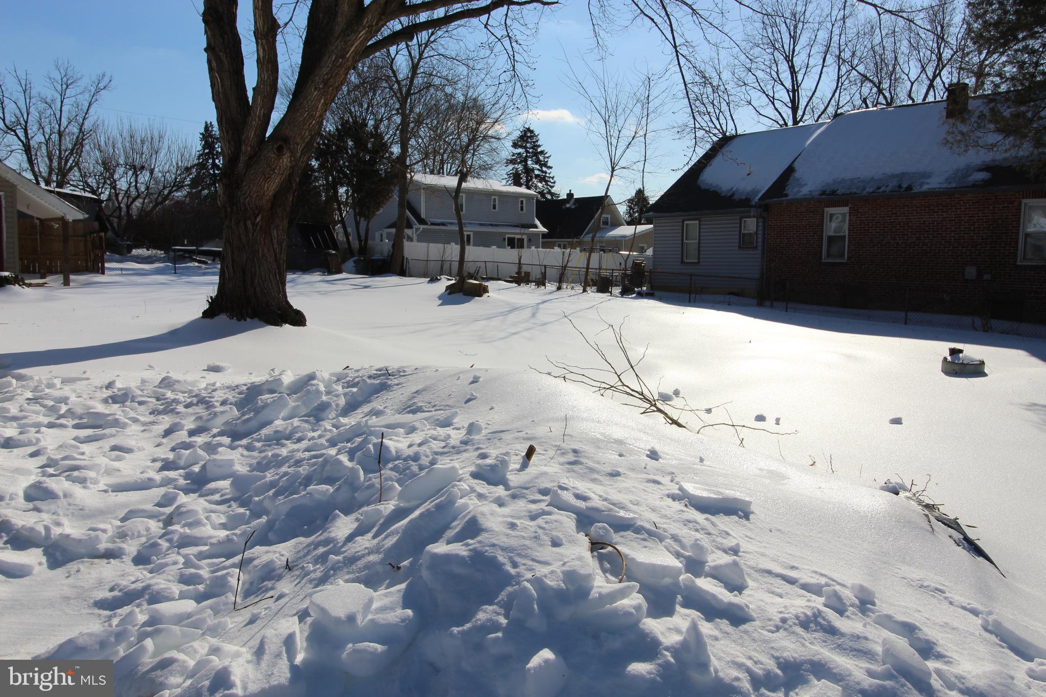 a street view covered with snow