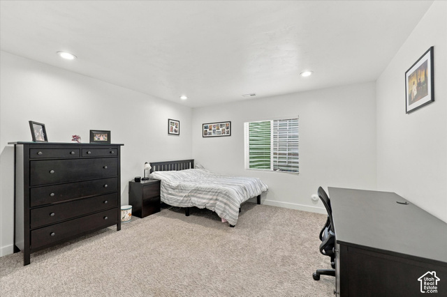 972 Vine Street Mapleton, UT 84664 - Photo 30 of 40 Recessed ceiling lighting, a window with horizontal blinds, neutral wall paint, and carpeted flooring