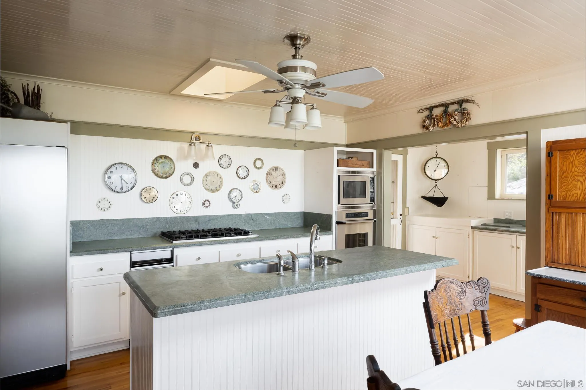 9844 Summit Drive La Mesa, CA 91941 - Photo 29 of 58 a living room with granite countertop furniture and fireplace