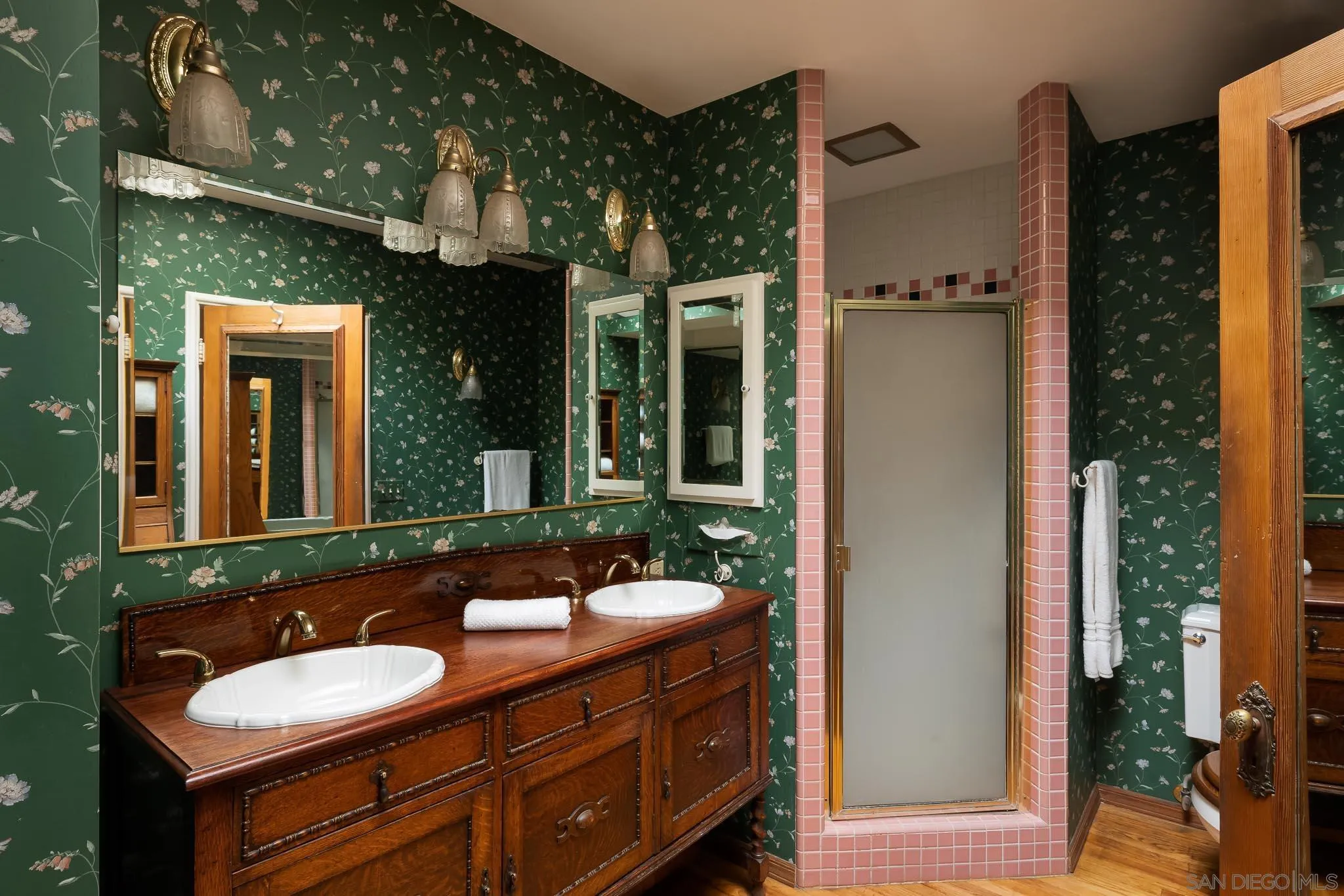 9844 Summit Drive La Mesa, CA 91941 - Photo 33 of 58 a bathroom with a sink and a mirror