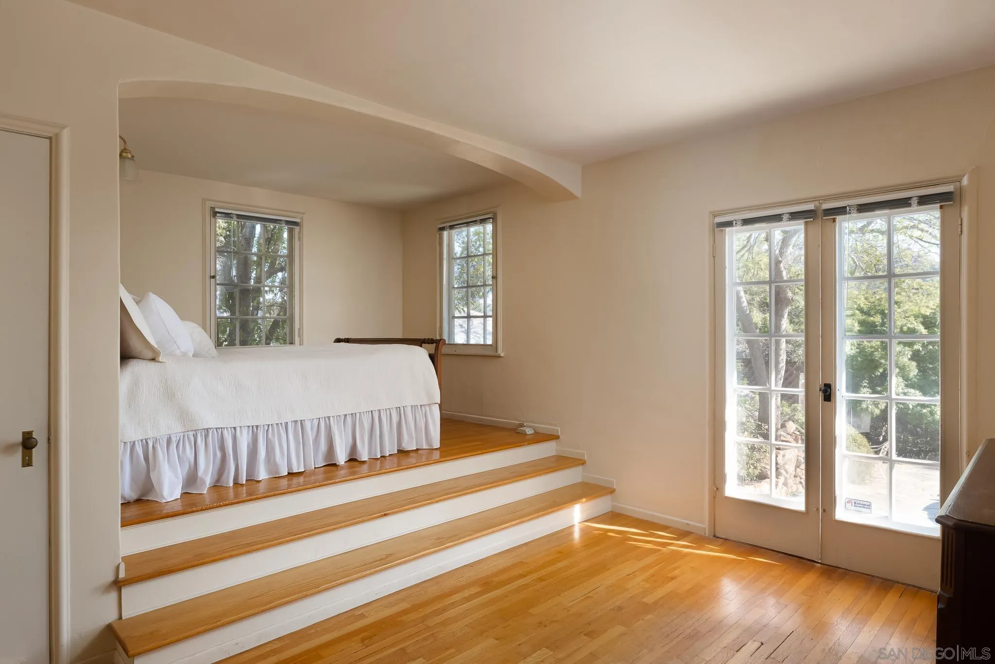 9844 Summit Drive La Mesa, CA 91941 - Photo 35 of 58 a bedroom with a bed and a large window