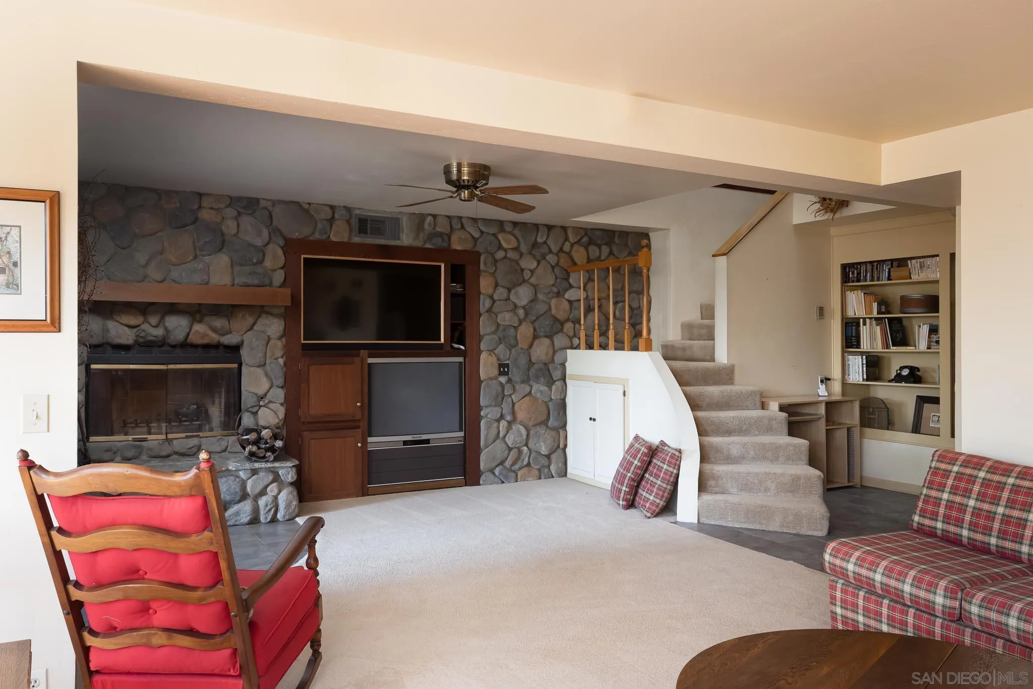 9844 Summit Drive La Mesa, CA 91941 - Photo 39 of 58 a living room with furniture and a flat screen tv