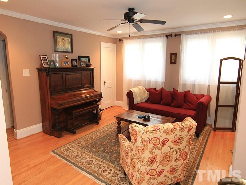 1630 Bickett Boulevard Raleigh, NC 27608 - Photo 5 of 18 a living room with furniture