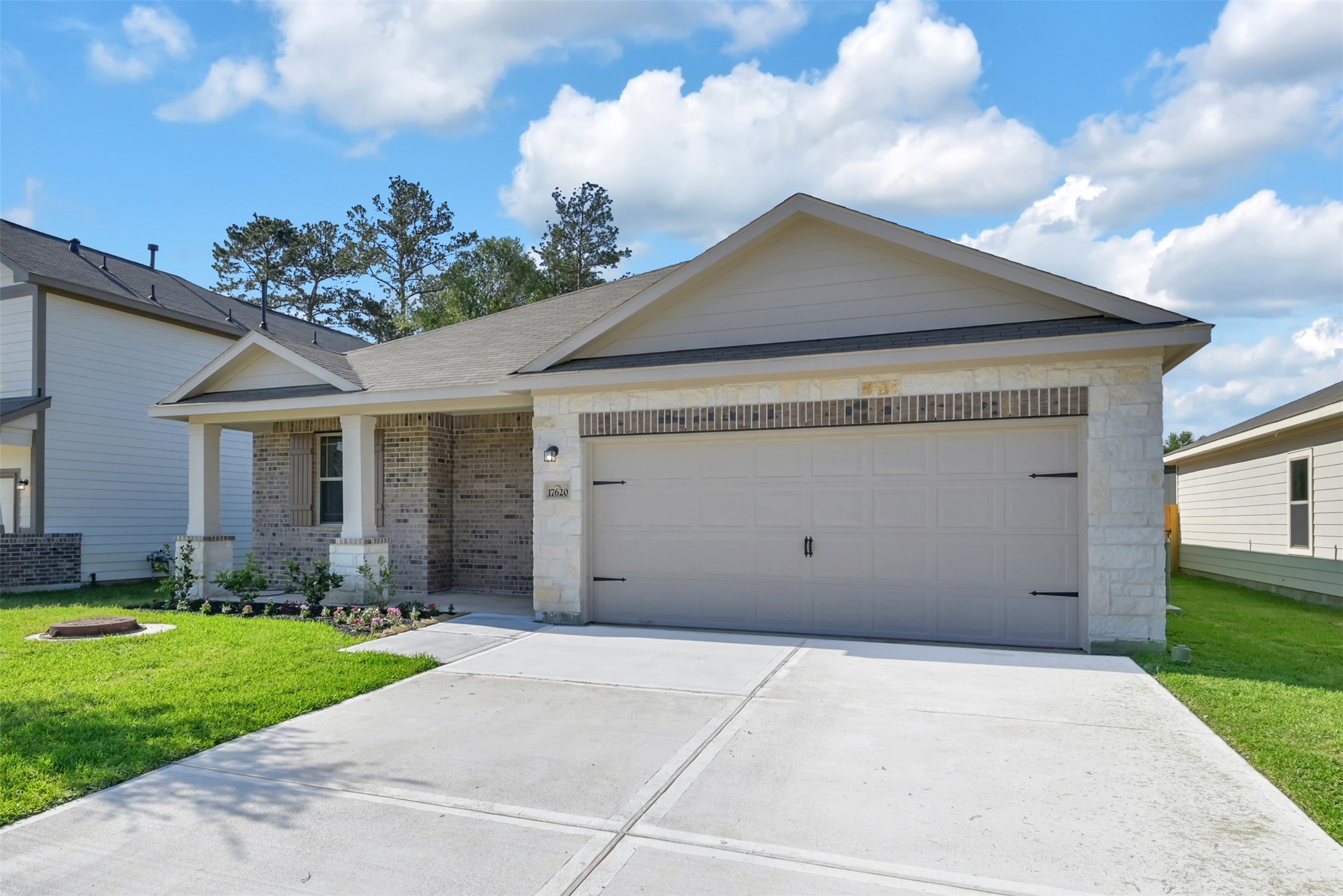 17620 Cedar Crest Drive Conroe, TX 77306 - Photo 2 of 15 a front view of a house with garden