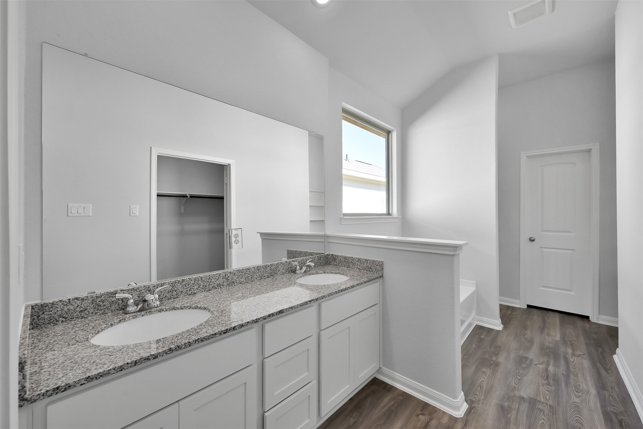 17620 Cedar Crest Drive Conroe, TX 77306 - Photo 10 of 15 a bathroom with a granite countertop sink and a mirror