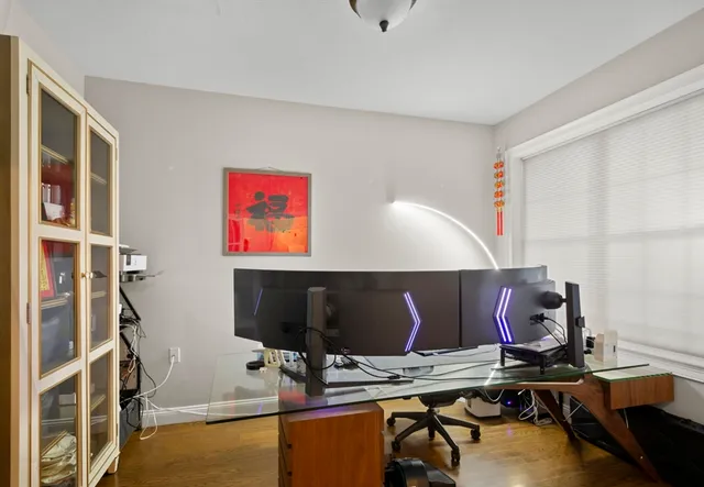 a room with furniture and air hockey table