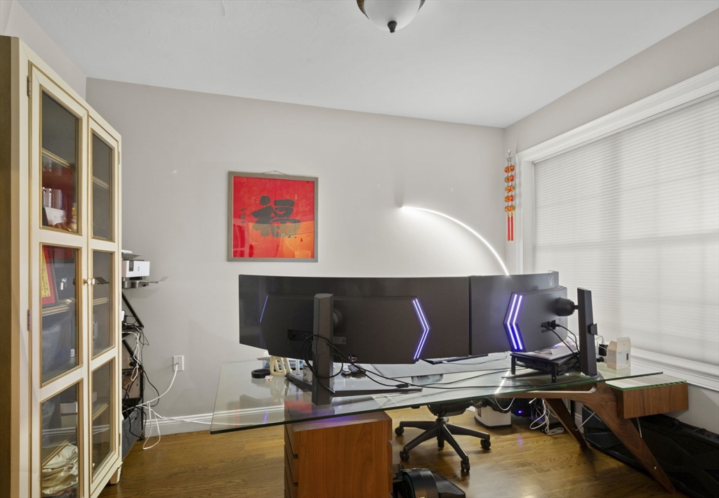 806 Ledgewood Way, Unit 806 Clinton, MA 01510 - Photo 20 of 42 a room with furniture and air hockey table