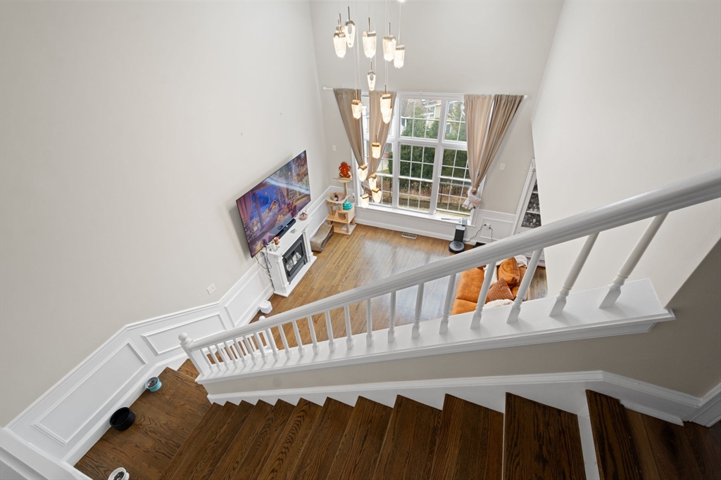806 Ledgewood Way, Unit 806 Clinton, MA 01510 - Photo 22 of 42 a view of entryway and hall with wooden floor