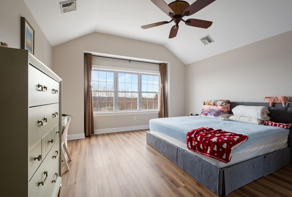 806 Ledgewood Way, Unit 806 Clinton, MA 01510 - Photo 24 of 42 a living room with furniture and a window
