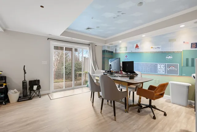 a view of a dining room with furniture window and outside view
