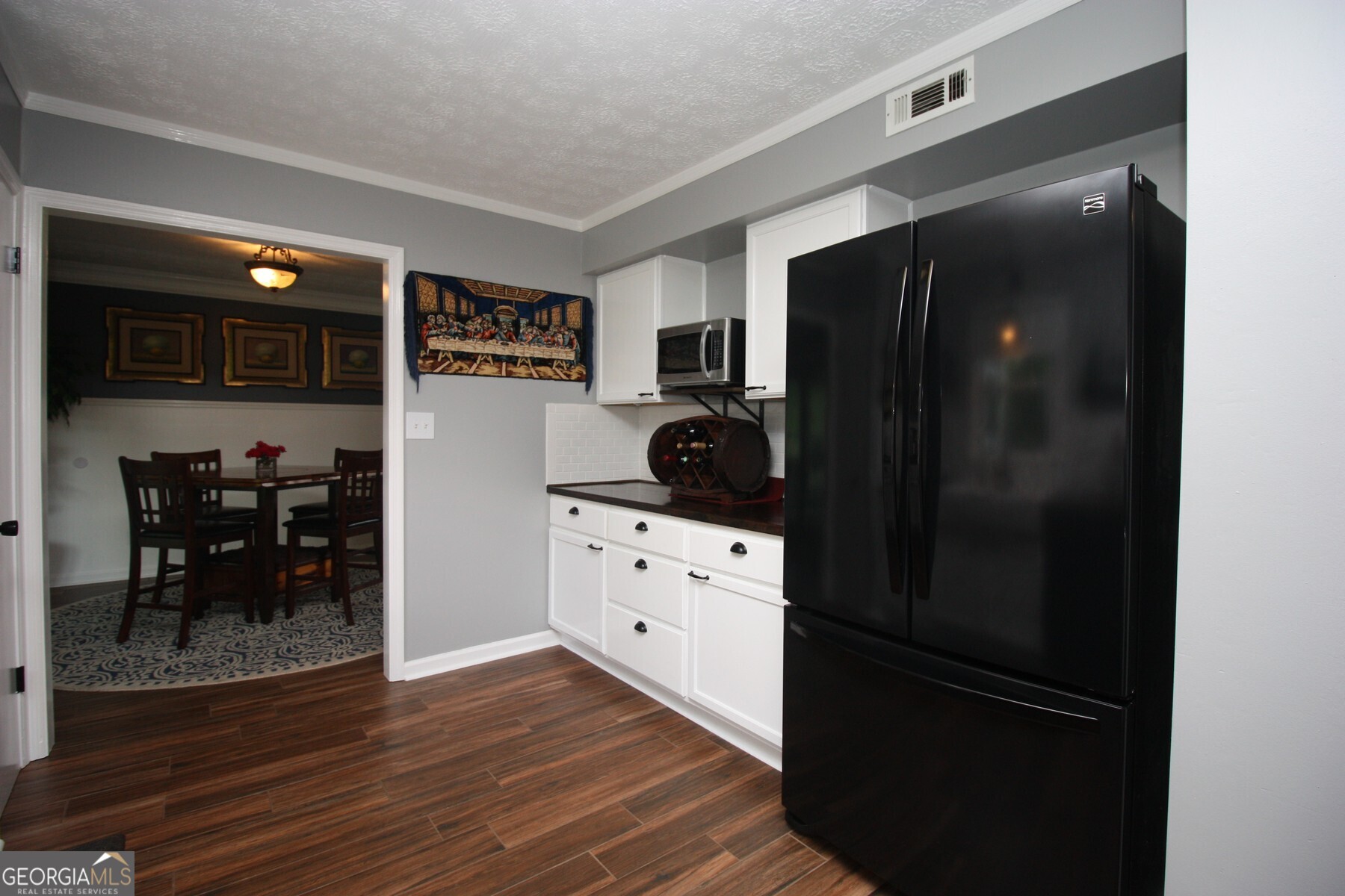 231 Murphy Road LaGrange, GA 30240 - Photo 10 of 24 a kitchen with stainless steel appliances a refrigerator stove and microwave