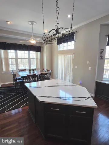 a kitchen with a counter space a sink and appliances