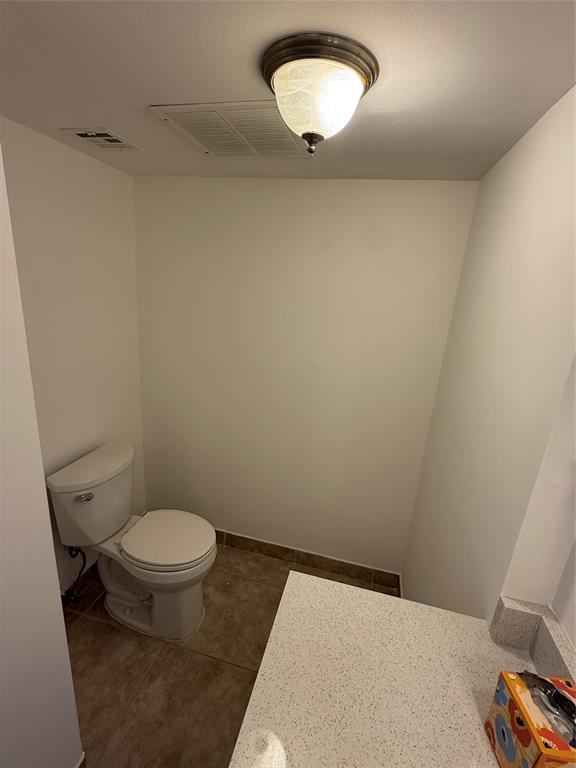 111 Briny Avenue, Unit PH17 Pompano Beach, FL 33062 - Photo 4 of 11 a bathroom with a toilet and a sink