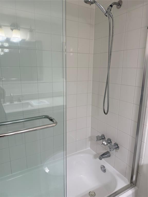 111 Briny Avenue, Unit PH17 Pompano Beach, FL 33062 - Photo 9 of 11 a bathroom with a sink and shower