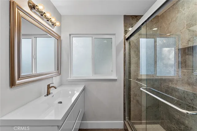 a bathroom with a bathtub and a sink