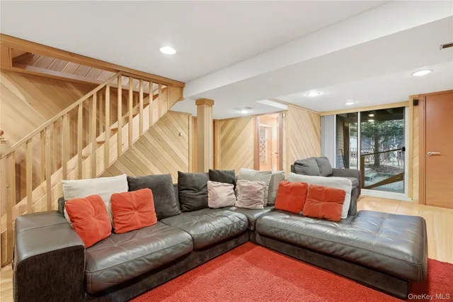 a blue and white sitting area with in a corridor