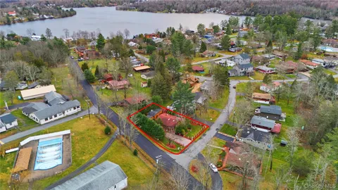 an aerial view of a house with a garden