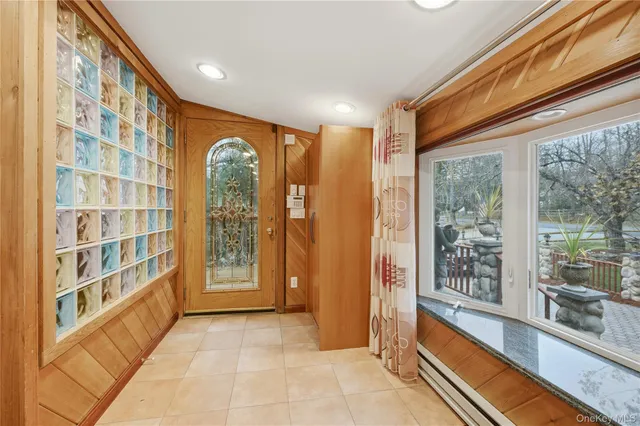 a view of a large room with windows