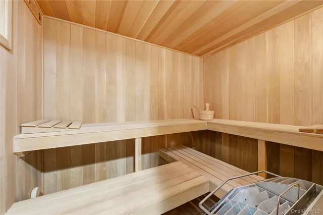 a kitchen with a window and cabinets