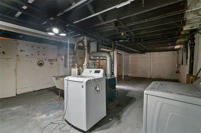 a utility room with dryer and washer
