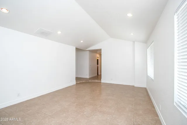 an empty room with a natural light